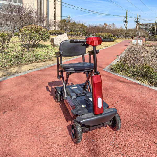 The EXC-1003B  Mobility Scooter is a heavy-duty, all-terrain electric scooter designed for durability, stability, and versatility, particularly for users requiring wheelchair integration. - Image 5
