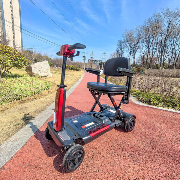 The EXC-1003B  Mobility Scooter is a heavy-duty, all-terrain electric scooter designed for durability, stability, and versatility, particularly for users requiring wheelchair integration. - Image 3