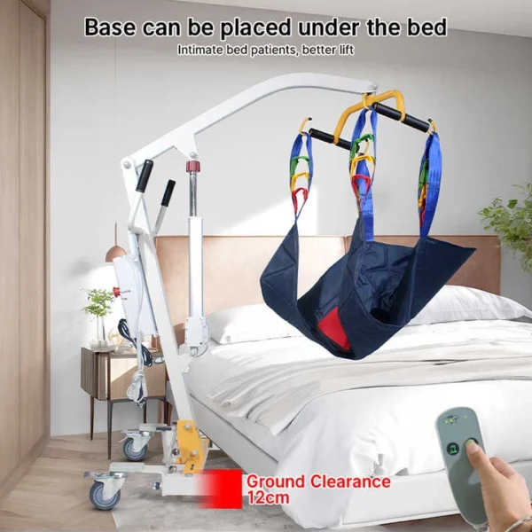 Patient lift placed under home bed with adjustable low ground base